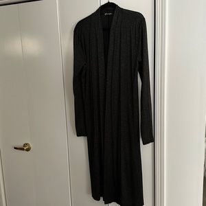 Crown Jewel mid calf open cardigan with side slits.